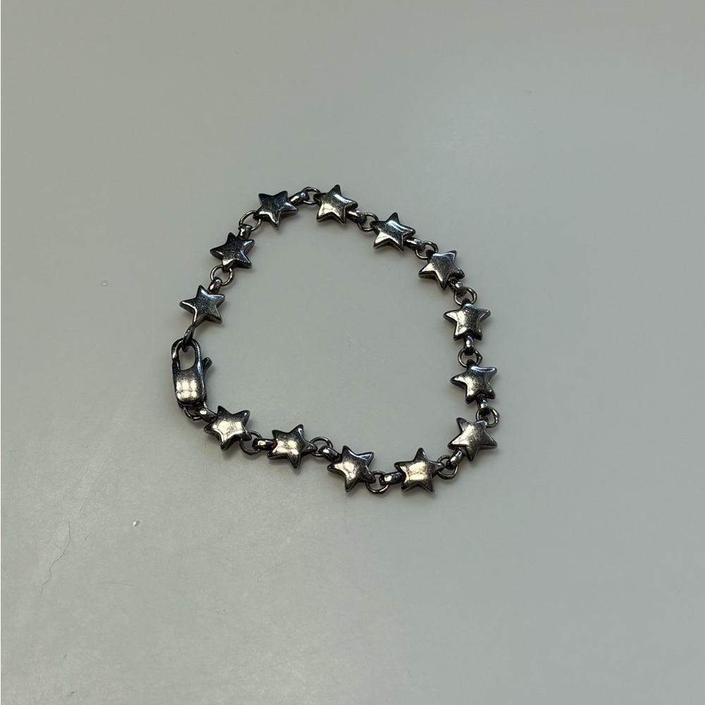 Authentic Tiffany’s star bracelet.